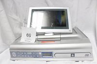 Front and side view with LCD screen partially extended and DVD player visible.