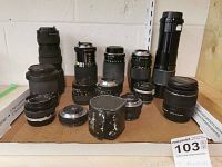 Front view of all lenses with MacKinnon case in center