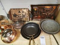 Full view of the copper kitchenware lot showing frying pans, copper trays, teapot, warmer, and metal bowl.
