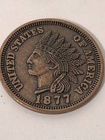 Front of 1877 Indian Head large cent showing detailed head and date.