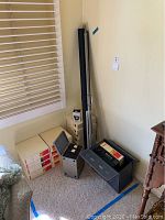 Full view of the projector, screen, carousels, storage containers, and boxes.