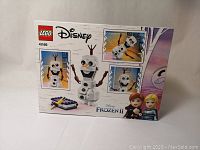 Box front showing Olaf LEGO figure and branding for Disney Frozen II, set number 41169.