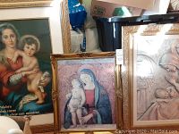 Group photo showing three religious art prints. Largest print has a gold frame without glass, medium and small prints have ornate gold frames and depict Madonna and Child figures.
