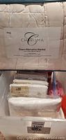 King size Charisma down alternative blanket in packaging with visible label