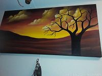 Full view of the original oil painting showing the entire tree silhouette and sunset landscape.