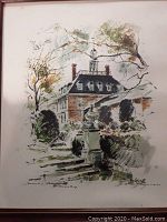 Photo of framed print showing colonial building and garden steps with autumn foliage and signature.