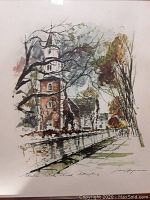 Art print showing Bruton Parish Church with artist signature and scene details.