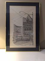 Full photo of framed black and white print depicting Old City Hall and a streetcar, showing overall condition and framing.
