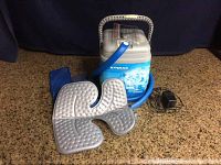 Front view of cooler unit, knee pad, tubing and adapter