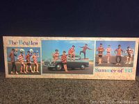 Front view of the Beatles Summer of '63 picture on board showing the full board with two images of the band and title text.