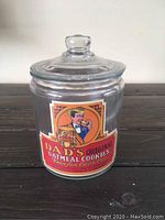 Front view of vintage glass canister with colorful Dad's Original Oatmeal Cookies label