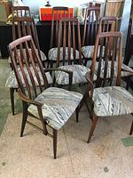 Eight chairs arranged in rows showing overall set composition.