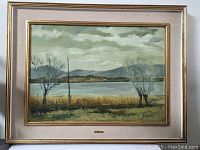 Full view of framed painting showing lakeside landscape and frame