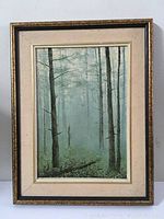 Front view of the framed painting against white background