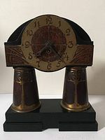 Full front view of the clock on white background