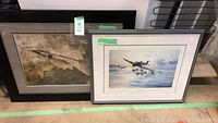 Two framed aviation prints side by side, one depicting a Hawker Typhoon on water and one showing an Avro Arrow jet