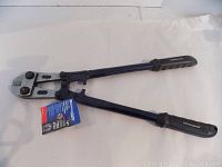 Full view of Mastercraft 18 inch bolt cutters showing handles, rubber grips with brand labeling, and cutting jaws with tag attached.