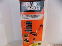 Box of the Black & Decker 14 inch Automatic Feed Trimmer/Edger showing product branding and features