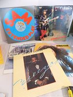 Five vinyl albums displayed, including covers of Sam Extended Play, Rick James Street Songs, George Benson Breezin', Chaka Khan What Cha' Gonna Do for Me, and George Benson The Other Side of Abbey Road.