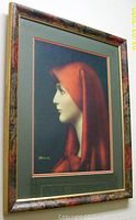 Framed front view of Jaques Henner art print showing profile of woman in red hood with marbled frame.