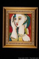 Front view of acrylic portrait painting on board in gilded frame against black background
