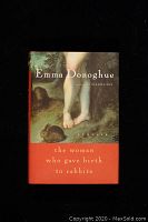Front cover of the book showing the title The Woman Who Gave Birth to Rabbits and author Emma Donoghue, with artistic imagery of legs and rabbit at the bottom.