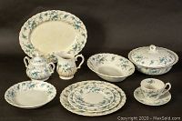 Overview of dinnerware set arranged on black background