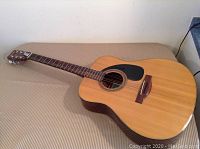 Full front view of dreadnought body showing top, grain and pickguard