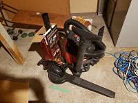 Photo showing Craftsman wet dry vacuum with hose attached and Toro blower vac placed beside it along with accessory kit box