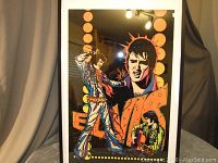 Full front view of framed blacklight poster showing design, mat and frame