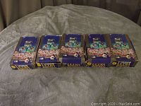 Five unopened boxes of 1991 Fleer Ultra Baseball cards arranged in a row showing front branding and player images