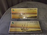 Photo of the boxed model ship kits side by side showing the front cover art with the ship images and kit names G1 Santa Maria and G2 Cutty Sark.
