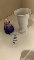 Both Royal Doulton Marie figurine and Rosenthal vase shown on a white surface with MaxSold lot card #8