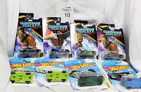 Eight Hot Wheels cars mint on card from Guardians of the Galaxy Vol. 2 collection, featuring Drax and Groot themed cars, shown front and back views in original packaging.