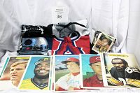 Lot includes large 5x7 Topps football cards, Topps and Leaf baseball trading cards spread out with a black T-shirt featuring an Anaheim Angels and Star Wars graphic.