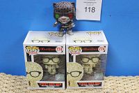 Two boxed Sticky Note Man Funko Pop figures and one unboxed Dorbz Tekken figure in front with auction bid tag.