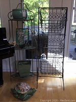 Two shelving units side by side with decorative items placed on and in them