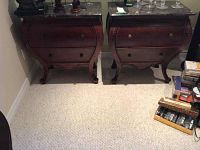 Front view of both side tables showing marble tops and bombe-shaped fronts