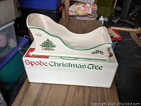 Large cream-colored ceramic sleigh centerpiece with green trim and Christmas Tree design, placed on top of its original Spode Christmas Tree box.