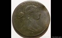 Obverse side of the 1801 Draped Bust Large Cent showing the portrait of Liberty and the date 1801.