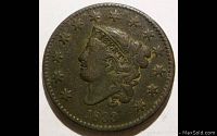 Front side of the 1833 Coronet Head Large Cent showing Liberty head, stars, and year date 1833.