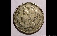 Obverse side of the 1866 Three Cent Nickel showing Lady Liberty with coronet and date.