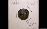 1833 Capped Bust dime in holder marked VG/F condition and price $45