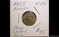 Front side of 1853 Seated Liberty dime showing date, arrows, and seating liberty design with shield and pole.