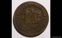 Obverse side of 1837 Hard Times Token featuring bust of Liberty with date 1837.