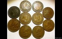 Top view of obverse sides showing profiles of monarchs on all 10 Canadian large cents from 1859 to 1917.