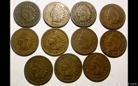 Obverse side of eleven Indian Head cents showing dates and details of the Native American headdress design.