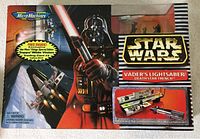 Front view of the Star Wars Micro Machines box featuring Vader's Lightsaber and Death Star Trench set, depicting large artwork of Darth Vader holding a lightsaber.