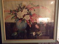 Framed print featuring a floral arrangement with bleeding heart flowers in a blue vase.