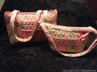 Two Vera Bradley bags shown side by side in pink and green floral quilted fabric with zippered tops and straps.